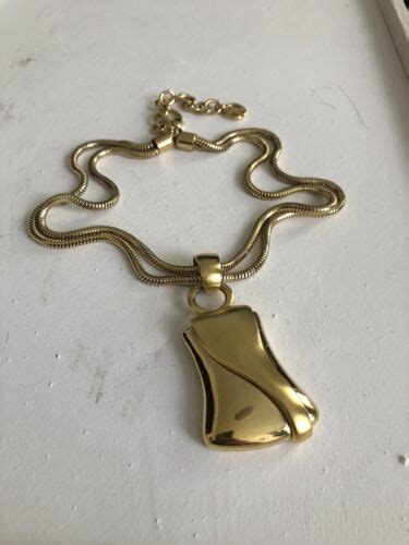 vintage givenchy paris new york silver snake chain necklace pendant|Vintage Givenchy Jewelry Guide .